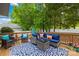 Cozy outdoor deck with stylish patio furniture creating a relaxing space for entertaining and lounging at 8020 Sheckler Ln, Matthews, NC 28104