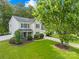 Charming home featuring lush landscaping and a spacious lawn providing excellent curb appeal at 8020 Sheckler Ln, Matthews, NC 28104