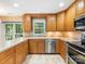 Bright kitchen featuring stainless steel appliances and ample counter space at 8201 Lansford Rd, Charlotte, NC 28277