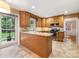 Kitchen with stainless steel appliances and wooden cabinetry at 8201 Lansford Rd, Charlotte, NC 28277