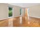 Bright living room with hardwood floors and large windows at 8201 Lansford Rd, Charlotte, NC 28277