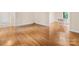 Open-concept living room with hardwood floors at 8201 Lansford Rd, Charlotte, NC 28277