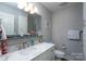 Bathroom featuring a white marble countertop vanity at 103 Poplar Trl, Rockwell, NC 28138