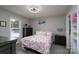 Bedroom featuring a flamingo-themed bed and matching decor at 103 Poplar Trl, Rockwell, NC 28138