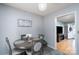 Bright dining area with a stylish table, comfortable seating, and convenient access to living spaces at 103 Poplar Trl, Rockwell, NC 28138