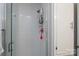 Shower featuring white tiled walls and glass doors at 103 Poplar Trl, Rockwell, NC 28138