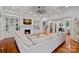 Living room showcasing a fireplace, built-in shelving, and open floor plan at 10300 Sweetleaf Pl, Charlotte, NC 28278