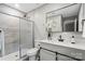 Bright, stylish bathroom with shower featuring glass doors and neutral tiling at 1055 Laurel Ave, Lancaster, SC 29720