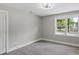 Empty bedroom featuring light gray walls and wood flooring for a blank canvas at 1055 Laurel Ave, Lancaster, SC 29720