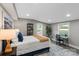 Bedroom with a bed, desk, and a large window that brings in natural light at 1055 Laurel Ave, Lancaster, SC 29720