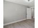 Bedroom displays the wall, trim and flooring at 1055 Laurel Ave, Lancaster, SC 29720