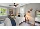Cozy bedroom featuring neutral walls, wooden ceiling fan and decorative accents at 1055 Laurel Ave, Lancaster, SC 29720