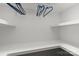 Spacious walk-in closet featuring ample shelving and storage space for organization at 1055 Laurel Ave, Lancaster, SC 29720