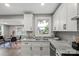 Bright kitchen with granite countertops and stainless steel appliances at 1055 Laurel Ave, Lancaster, SC 29720