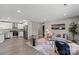 Open-concept living room and kitchen with stainless steel appliances and modern decor at 1055 Laurel Ave, Lancaster, SC 29720