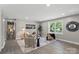 Modern living area with neutral tones and seamless access to dining area at 1055 Laurel Ave, Lancaster, SC 29720