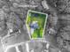 Aerial view of property highlighting lot lines, home, and outdoor spaces at 107 Ingonish Dr, Gastonia, NC 28056