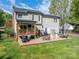 Spacious backyard patio area, perfect for outdoor entertaining and relaxation at 107 Ingonish Dr, Gastonia, NC 28056