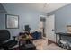 Comfortable room with gaming setup, cozy chair, and closet for storage at 107 Ingonish Dr, Gastonia, NC 28056