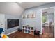 Bright playroom with chalkboard wall and ample storage for toys and games at 107 Ingonish Dr, Gastonia, NC 28056