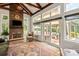 Bright living room featuring vaulted ceilings, a stone fireplace, and an abundance of natural light at 1085 Wessington Manor Ln, Fort Mill, SC 29715