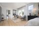 Open bedroom with sitting area, light-colored floors, and ample natural light at 11024 Shreveport Dr, Huntersville, NC 28078