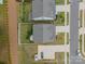 Aerial view of two houses showing roof details, driveways, and landscaping at 113 Summerhill Dr, Mooresville, NC 28115