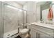 Modern bathroom features a walk-in shower with marble-style tile at 113 Summerhill Dr, Mooresville, NC 28115