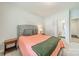 Comfortable bedroom with a neutral color palette and natural light at 113 Summerhill Dr, Mooresville, NC 28115