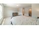 Bedroom featuring neutral walls, plush carpet, and a dark dresser; lots of natural light at 113 Summerhill Dr, Mooresville, NC 28115