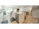Bright, modern kitchen island with stainless steel appliances and open floor plan at 113 Summerhill Dr, Mooresville, NC 28115