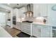 Kitchen features white cabinets, stainless steel appliances, and gas cooktop at 113 Summerhill Dr, Mooresville, NC 28115