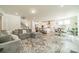 Expansive open concept living area with a seamless flow between kitchen, dining, and living spaces at 113 Summerhill Dr, Mooresville, NC 28115