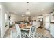 Open concept living spaces include kitchen, dining, and living room with stylish decor at 113 Summerhill Dr, Mooresville, NC 28115