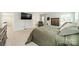 Large main bedroom boasts plush carpeting, neutral decor, and features a TV for easy viewing at 113 Summerhill Dr, Mooresville, NC 28115