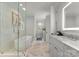 The main bathroom offers a glass shower, a soaking tub, and bright vanity lighting at 1160 S Kings Dr, Charlotte, NC 28207