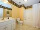 Functional bathroom with shower, vanity and classic design creates a clean and practical space at 1209 S South St, Gastonia, NC 28052