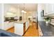 Spacious kitchen with stainless steel appliances, a large island with granite countertops, and ample cabinet space at 1209 S South St, Gastonia, NC 28052