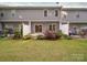 Backyard featuring mature landscaping and a patio at 12231 Stratfield Place Cir, Pineville, NC 28134