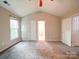 Spacious main bedroom with vaulted ceiling, plush carpeting, and natural light from a window at 12231 Stratfield Place Cir, Pineville, NC 28134