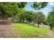 Backyard with a privacy fence and lush green grass, great for outdoor activities at 1410 Swaying Branch Ln, Clover, SC 29710