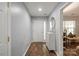 Welcoming entryway with wood flooring, white trim and easy access to the dining and living areas at 1410 Swaying Branch Ln, Clover, SC 29710