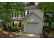 Charming two-story home featuring a garage and a well-manicured front yard at 1410 Swaying Branch Ln, Clover, SC 29710