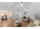 Bright living room boasts soaring ceilings, a fireplace, and hardwood floors at 1410 Swaying Branch Ln, Clover, SC 29710