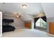 Spacious bedroom with a bunk bed, vaulted ceiling, and built in storage cabinets at 1509 Churchill Downs Dr, Waxhaw, NC 28173