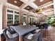 Covered patio featuring a spacious dining area and comfortable seating at 1509 Churchill Downs Dr, Waxhaw, NC 28173