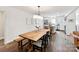 Dining area with view of kitchen area featuring modern finishes at 1638 Wensley Dr, Charlotte, NC 28210