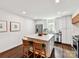 Kitchen with an island and counter seating, along with updated appliances at 1638 Wensley Dr, Charlotte, NC 28210