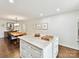 Spacious kitchen island with marble countertop, ample storage, and modern fixtures at 1638 Wensley Dr, Charlotte, NC 28210