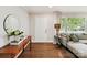 Cozy living room featuring hardwood floors, and stylish decor at 1638 Wensley Dr, Charlotte, NC 28210